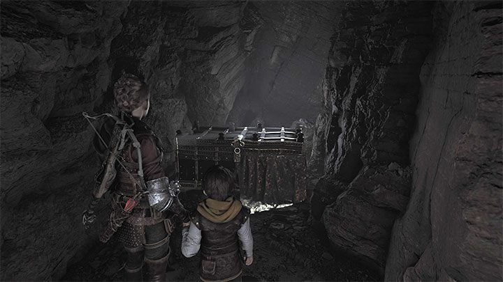 How do you open the large door in the underground area in chapter 11 in A Plague  Tale: Requiem?