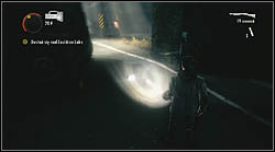 Another manuscript page lies next to a light post, near the tunnel entrance - Alan Wake: Episode 6 Departure - list of manuscript pages - Manuscript - Alan Wake Game Guide & Walkthrough