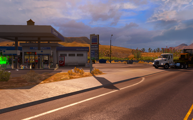 On a highway a special sign will inform you about approaching a gas station and a park space - Using gas stations; driver resting - Driving your truck across the States - American Truck Simulator - Game Guide and Walkthrough