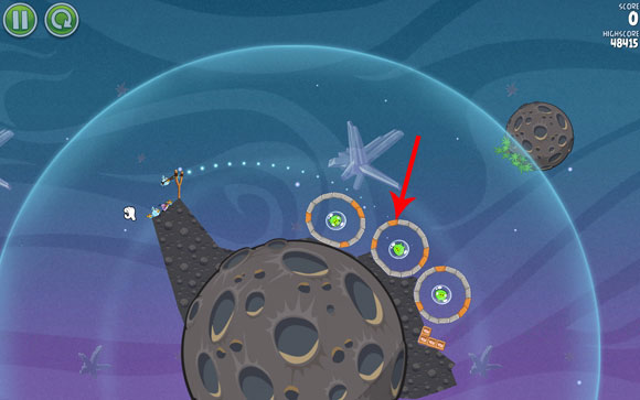Your first goal is to destroy the wooden block in the second hoop and fly inside it - to freeze the blocks at the bottom - Level 2-5 - Cold Cuts - Angry Birds Space - Game Guide and Walkthrough