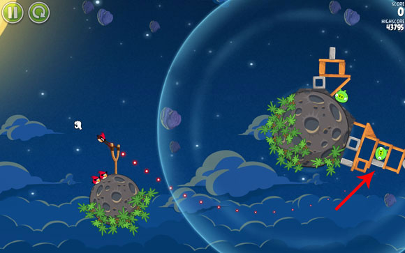 Aim the bird at the concrete plank - Level 1-7 - Pig Bang - Angry Birds Space - Game Guide and Walkthrough
