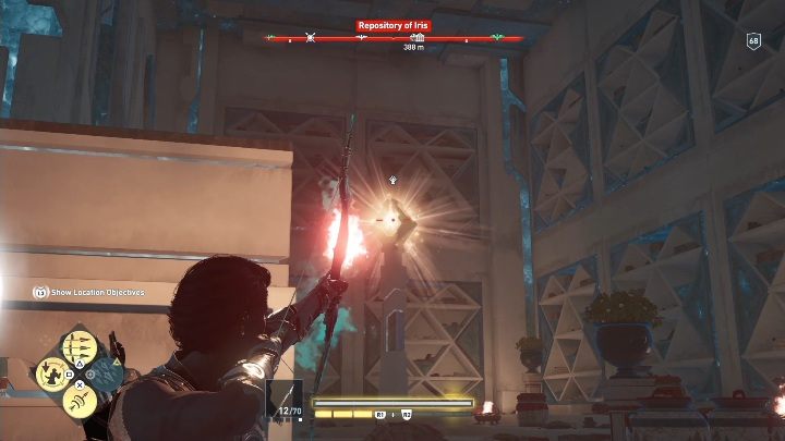 The second torch is hidden on the left, behind the shelves - AC Odyssey Fate of Atlantis: Repository of Iris, Archives - Archives - Assassins Creed Odyssey Guide