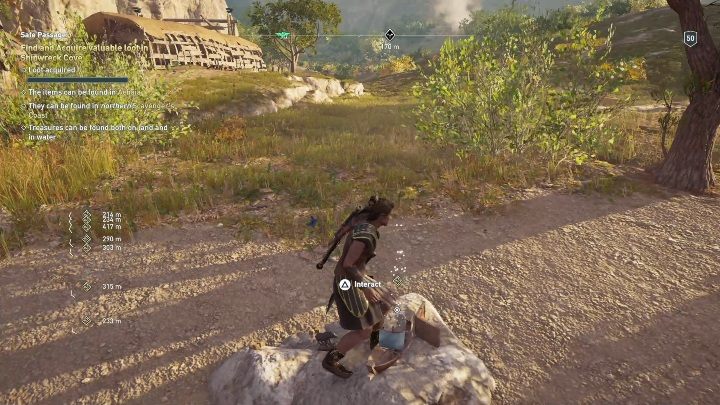 You will find the first item on the stone on the right side of the beach - AC Odyssey Legacy of the first blade: Chasing the Storm - Episode 2 - Shadow Heritage - Assassins Creed Odyssey Guide