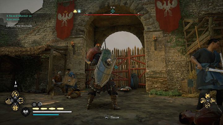 You can destroy the wooden blockade in two ways: blow it up (you will find oil jugs on the left side, next to the spare boxes) or shoot the obstacle using the ballista - Assassins Creed Valhalla: A Sword-Shower in Anecastre - Lincolnscire - Assassins Creed Valhalla Guide and Walkthrough