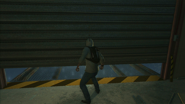 Eventually you will reach an empty warehouse where you will have to slide below a half-open gate - Sequence 5 - First Power Source | Assassins Creed III Remastered Walkthrough - Walkthrough - Assassins Creed III Game Guide & Walkthrough