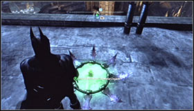 Stand beside the Trophy cage, turn west and walk forward a bit - Batman trophies (01-14) | Park Row - Park Row - Batman: Arkham City Game Guide