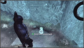 Stop by the edge nearby where the Trophy is hidden - Batman trophies (01-14) | Park Row - Park Row - Batman: Arkham City Game Guide