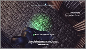Check out the narrow alley behind the fence to find a spot where you can perform a slide #1 - Batman trophies (15-24) | Park Row - Park Row - Batman: Arkham City Game Guide