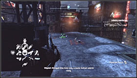 Find the pressure plate nearby the Trophy cage and stand on it #1 - Batman trophies (25-36) | Park Row - Park Row - Batman: Arkham City Game Guide