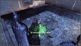 Make the Batarang fly through the whole shaft and hit the interactive question mark #1 - Batman trophies (25-36) | Park Row - Park Row - Batman: Arkham City Game Guide