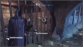 Eventually you should reach the grate with the Trophy behind it #1 - Batman trophies (11-18) | Amusement Mile - Amusement Mile - Batman: Arkham City Game Guide