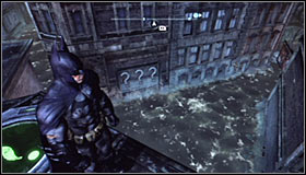 Search for the Trophy cage on one of the lower parts of the roof #1 and afterwards look for the three interactive question marks right beside the water #2 - Batman trophies (11-18) | Amusement Mile - Amusement Mile - Batman: Arkham City Game Guide