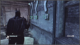 Approach each of the question marks using the grapple points (Batclaw) and spray Explosive Gel onto them #1 - Batman trophies (11-18) | Amusement Mile - Amusement Mile - Batman: Arkham City Game Guide