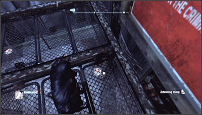 The while fenced area around the Trophy is a minefield which you have to pass through - Batman trophies (19-28) | Amusement Mile - Amusement Mile - Batman: Arkham City Game Guide