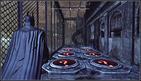 After reaching the destination you should note that the Trophy is inside a big cage #1 and that the access is blocked by red pressure plated that you cannot touch #2 - Batman trophies (19-28) | Amusement Mile - Amusement Mile - Batman: Arkham City Game Guide