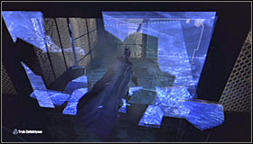 Glide south, towards the wooden wall nearby the water #1 - Catwoman trophies | Amusement Mile - Amusement Mile - Batman: Arkham City Game Guide