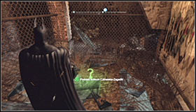 There are three weak wall separating you from the secret and depending on your likings you can either use the Explosive Gel #1 or break through them with the Line Launcher - Batman trophies (09-16) | Industrial District - Industrial District - Batman: Arkham City Game Guide