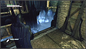 Approach the bridge which raises with the water level and turn right - Batman trophies (09-16) | Industrial District - Industrial District - Batman: Arkham City Game Guide