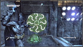 Stand on one of the pressure plates beside the Trophy cage and note that is has caused one of the question marks in the distance to light up #1 - Batman trophies (26-37) | Industrial District - Industrial District - Batman: Arkham City Game Guide