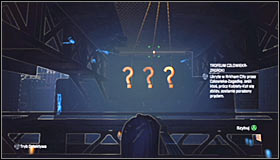 The Trophy cage is found below the big bridge #1 and you should start off by reaching the monorail track #2 - Batman trophies (22-30) | Bowery - Bowery - Batman: Arkham City Game Guide