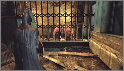 After reaching the destination, scan the Abramovici twins, sitting with their back onto you (screen above) - Riddles | Steel Mill - Steel Mill - Batman: Arkham City Game Guide