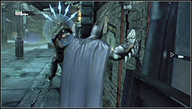 Approach the wall and examine the fragment below the CANCELLED sign #1 - Locate the secret entrance using the video data | Main story - Main story - Batman: Arkham City Game Guide
