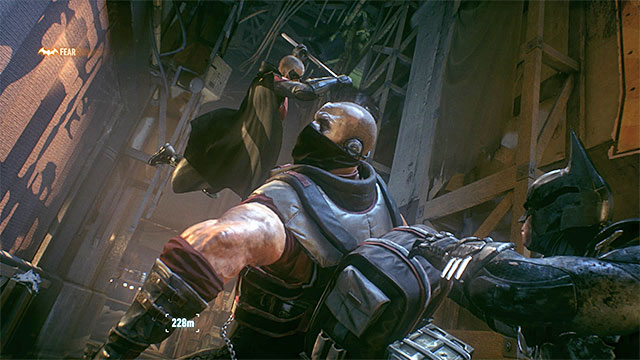 Batman and Robin can perform a Team Attack on the enemy with a minigun - Apprehend Christina Bell in sound stage B | Main story | Batman Arkham Knight - Main story - Batman: Arkham Knight Game Guide & Walkthrough