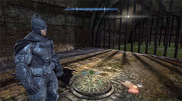 The best way to reach the Burnley Sewers is through the manhole shown in the screenshot, which you use for the first time during the Scan the corpse in the GCPD morgue maim mission - The Burnley District - entrances to the police station and the sewers | Enigma Datapacks - Enigma Datapacks - Batman: Arkham Origins Game Guide