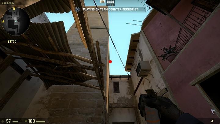 Stand right next to the wooden post and aim at the point shown in the screenshot - Mirage | Tournament maps in CS GO - Tournament Maps in Counter Strike: Global Offensive - CS GO Game Guide
