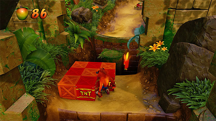 While in the jungle, you must watch out in places with TNT chests - an unwise attack might detonate them too early - Crash Bandicoot N. Sane Trilogy: Rolling Stones - Crash Bandicoot N. Sane Trilogy: Crash Bandicoot - N. Sanity Island - Crash Bandicoot N. Sane Trilogy Game Guide