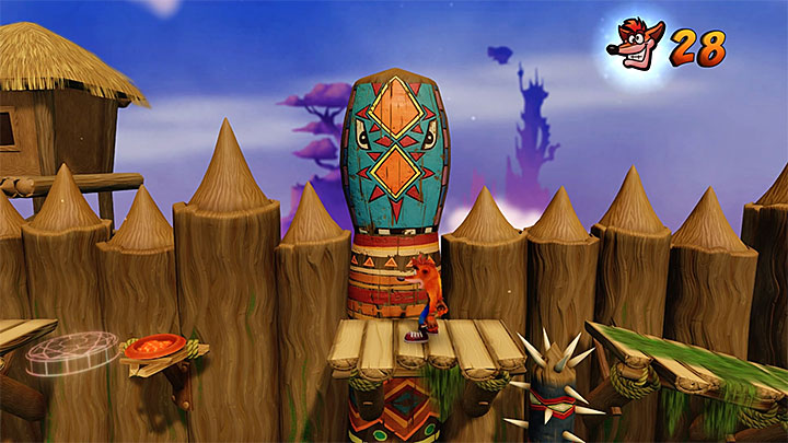 In the place shown on the above picture you can place the red gem - it can be unlocked by performing a perfect run (no dying, all chests destroyed) in Slipper Climb level later in the game - Crash Bandicoot N. Sane Trilogy: Native Fortress - Crash Bandicoot N. Sane Trilogy: Crash Bandicoot - N. Sanity Island - Crash Bandicoot N. Sane Trilogy Game Guide