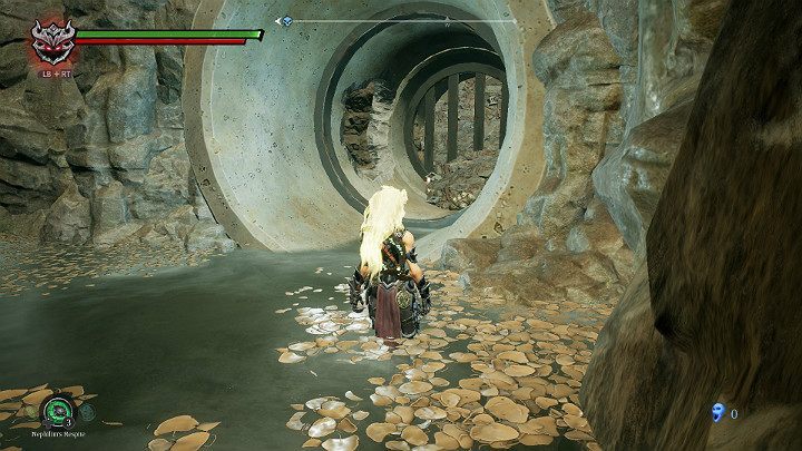 Enter the large drain pipe, collect the item and go through a hole in the wall - The drowned district | Darksiders 3 Walkthrough - Walkthrough - Darksiders 3 Guide
