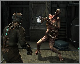 Leave the room going to the cargo hallway and turn left when you reach the wide corridor (remember to check the container) - New Arrivals Part 2 | Walkthrough - Walkthrough - Dead Space Game Guide & Walkthrough
