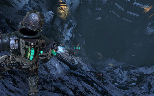 Before you start the pursuit, it would be good to look around and pick up supplies from crates - Follow Danik down the Research Silo | 16: What Lies Below - 16: What Lies Below - Dead Space 3 Game Guide