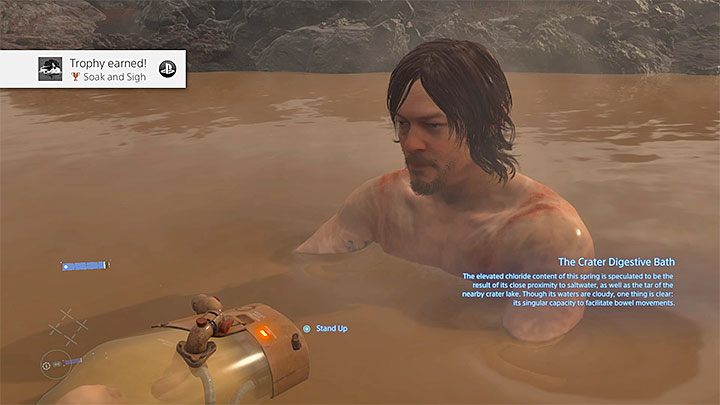 The main character will undress and begin to bathe in the hot spring - Soak and Sigh trophy | Death Stranding - Trophy Guide - Death Stranding Guide