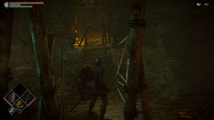 Instead of going towards the fog, climb the ladder, and then go to the bridge - Demons Souls Remake: Depraved Chasm (5-1) - walkthrough - Valley of Defilement (Region 5) - Demons Souls Remake Guide