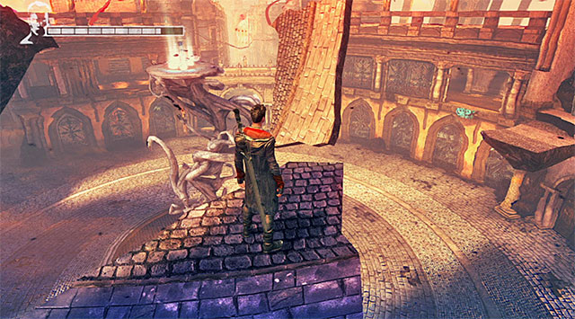 You should land on a shelf, where you should use Ophion Demon Pull - Finding the Blue Rose - 3: Bloodline - DMC: Devil May Cry - Game Guide and Walkthrough