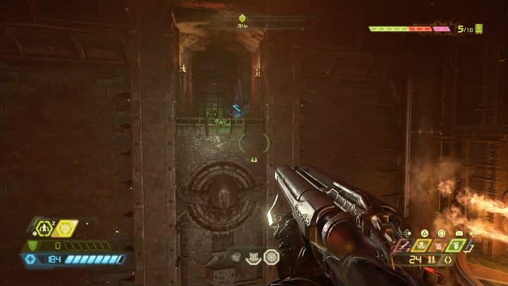 To get to the map, you have to jump to the top of the burning trap and then jump to a safe rock shelf - Doom Eternal: Nekravol 2 secrets maps and location - Collectibles and secrets - Doom Eternal Guide