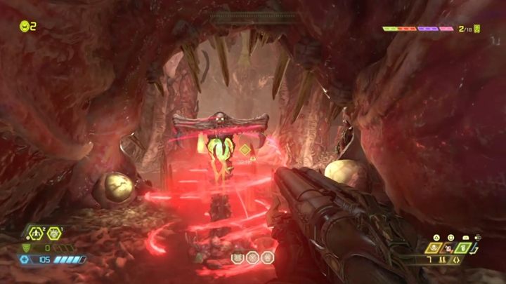 After the battle, swing on the bar to jump up towards the tunnel - Doom Eternal: Super Gore Nest walkthrough - Levels walkthrough - Doom Eternal Guide