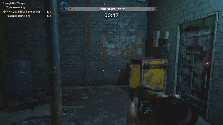 The next bomb is inside the red building, the one where you have activated the switch - Through the Wringer | Far Cry New Dawn Walkthrough - Story Missions - Far Cry New Dawn Guide