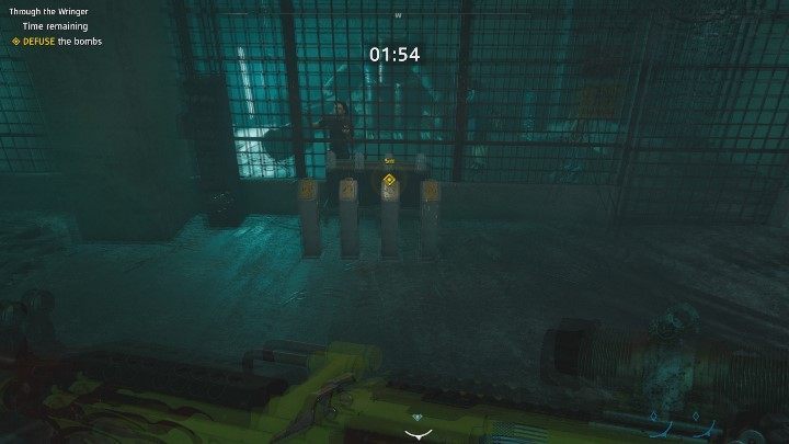 After disarming the four bombs, go to the basement in the red building - Through the Wringer | Far Cry New Dawn Walkthrough - Story Missions - Far Cry New Dawn Guide