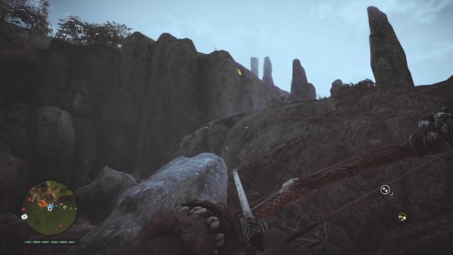 While standing at the bottom, near a place where you might start a sidequest, look up - Izila masks - Southern Oros - Far Cry Primal - Game Guide and Walkthrough