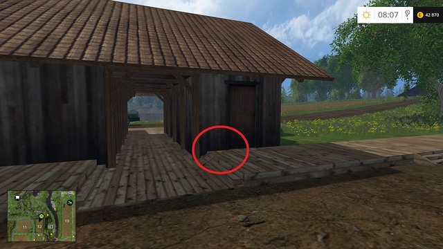 Behind a building on field no - Section C - coins 30 - 44 - Gold Coins - Farming Simulator 15 Game Guide