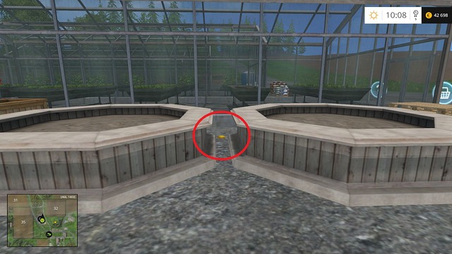 In front of the greenhouse, between two large flowerpots - Section E - coins 55 - 69 - Gold Coins - Farming Simulator 15 Game Guide