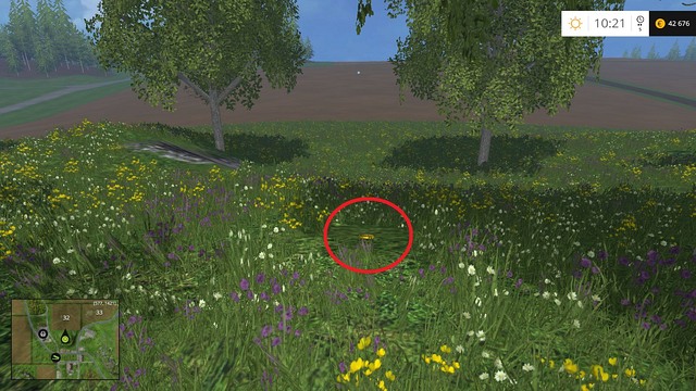 In the grass, near a tree - Section E - coins 55 - 69 - Gold Coins - Farming Simulator 15 Game Guide