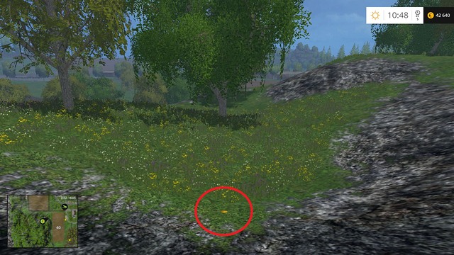 On the ground near some rocks - Section E - coins 55 - 69 - Gold Coins - Farming Simulator 15 Game Guide