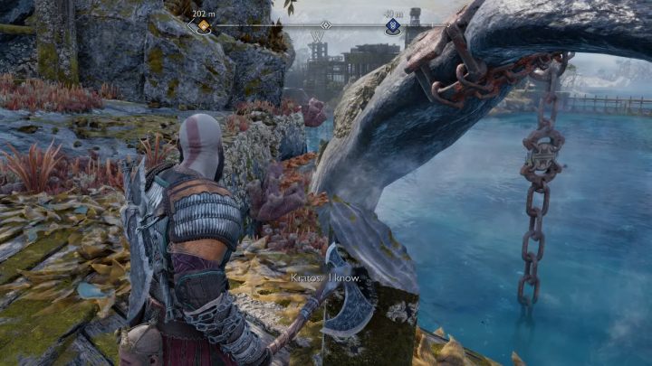 When the creature lifts up the second fin, throw the axe at the weak point on the chain to free it - God of War Ragnarok: The Weight of Chains - favor, walkthrough - God of War Ragnarok: Favors - Svartalfheim - God of War Ragnarok Guide