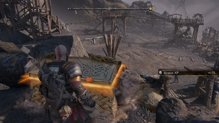 You will find the Legendary Chest, along with the artifact, in a secret area a huge crane leads to - God of War Ragnarok: Jarnsmida Pitmines, Svartalfheim - secrets, collectibles - God of War Ragnarok: Svartalfheim - God of War Ragnarok Guide