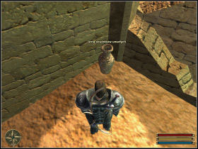 Look for the urns in the part of the ruins described as