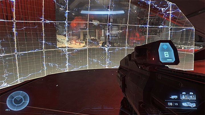 Once you start fighting, you can either defend yourself in one spot in the hangar or be on the move - Halo Infinite: House of Reckoning - walkthrough - Main missions - Halo Infinite Guide
